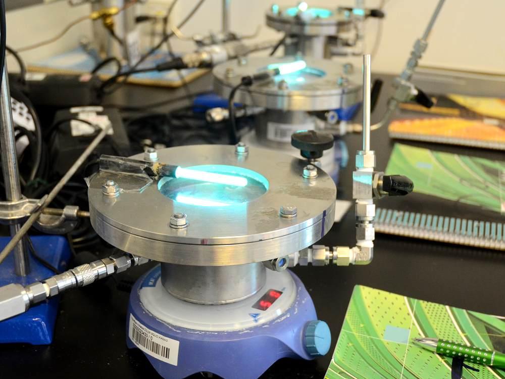 Photocatalytic reduction of carbon dioxide can be enhanced by a TiO<sub>2</sub> photocatalyst with graphene oxide